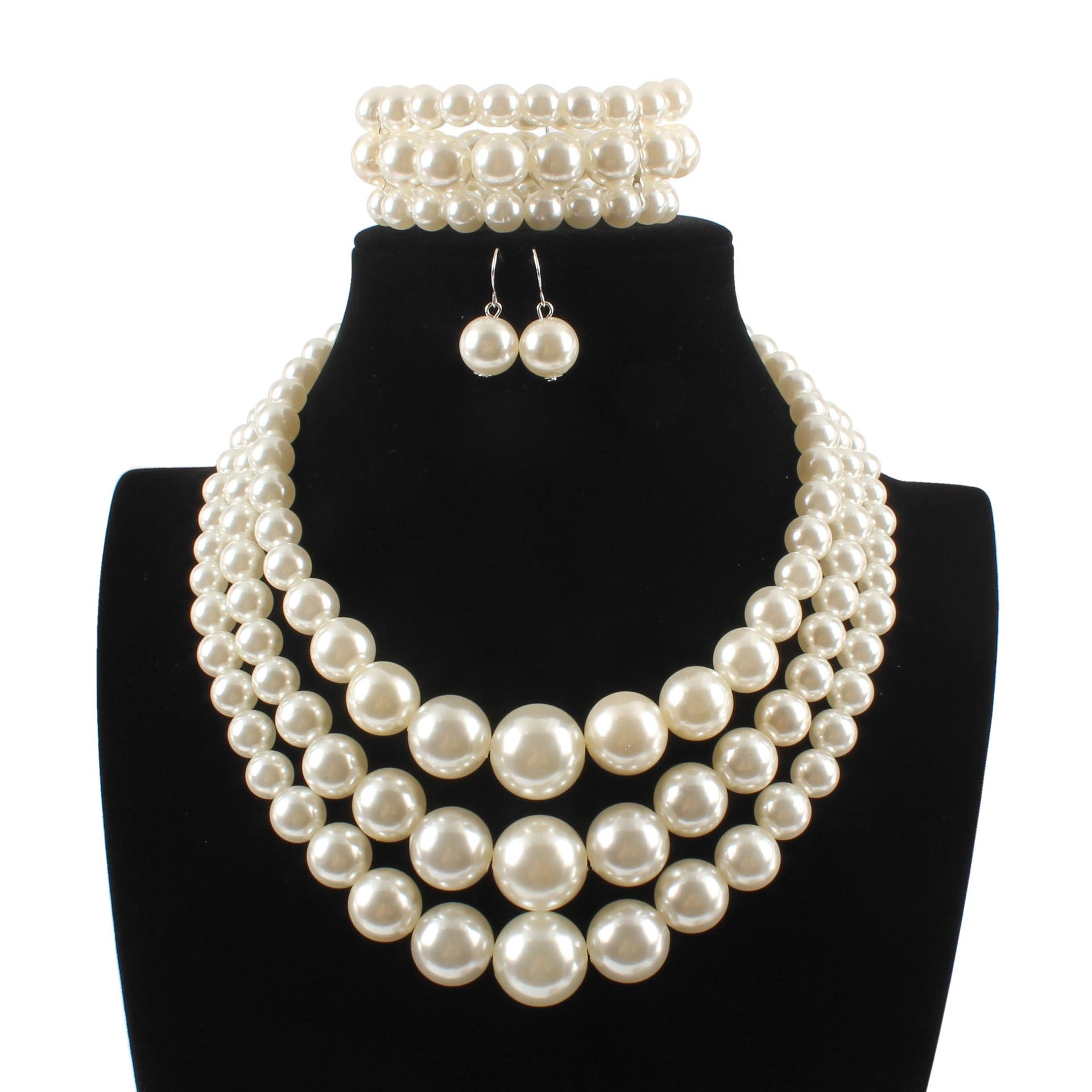 Comercio al por mayor de perlas de imitación de plástico pendientes collar conjunto de joyas